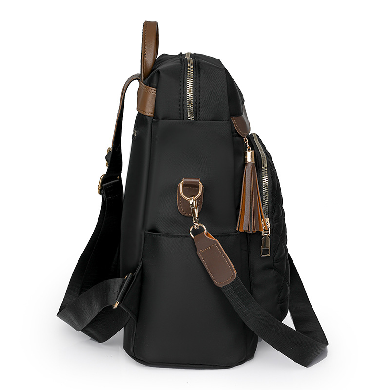 Mochila de nailon multifuncional para mujer 2024 nuevo estilo casual mochila de viaje de viaje línea de bordado de moda mochila escolar de gran capacidad