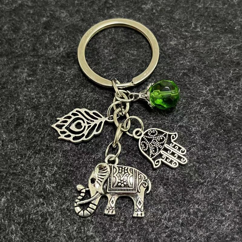 Elephant Palm Peacock Feather Beads Bohemian Style Keychain Tribal Mysterious Amulet Keychain Elephant Palm Peacock Feather Beads Bohemian Style Keychain Tribal Mysterious Amulet Keychain
