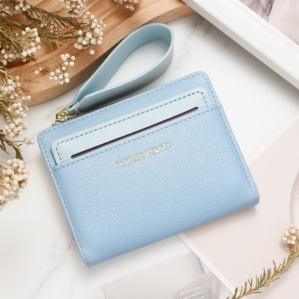 Nueva billetera corta de mujer fresca y simple doble cremallera bolso de cambio multi-tarjeta bolso multifuncional