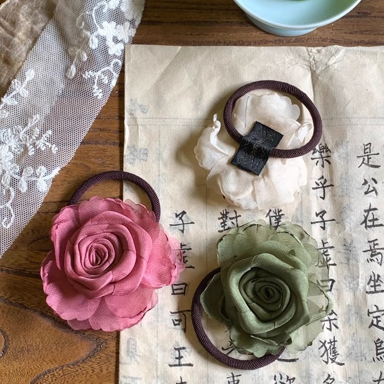 Nueva onda verde china 2024 nuevo estilo nacional rosa correa de cabello de correa de cabello de mujer atada flor de cabeza de alta calidad