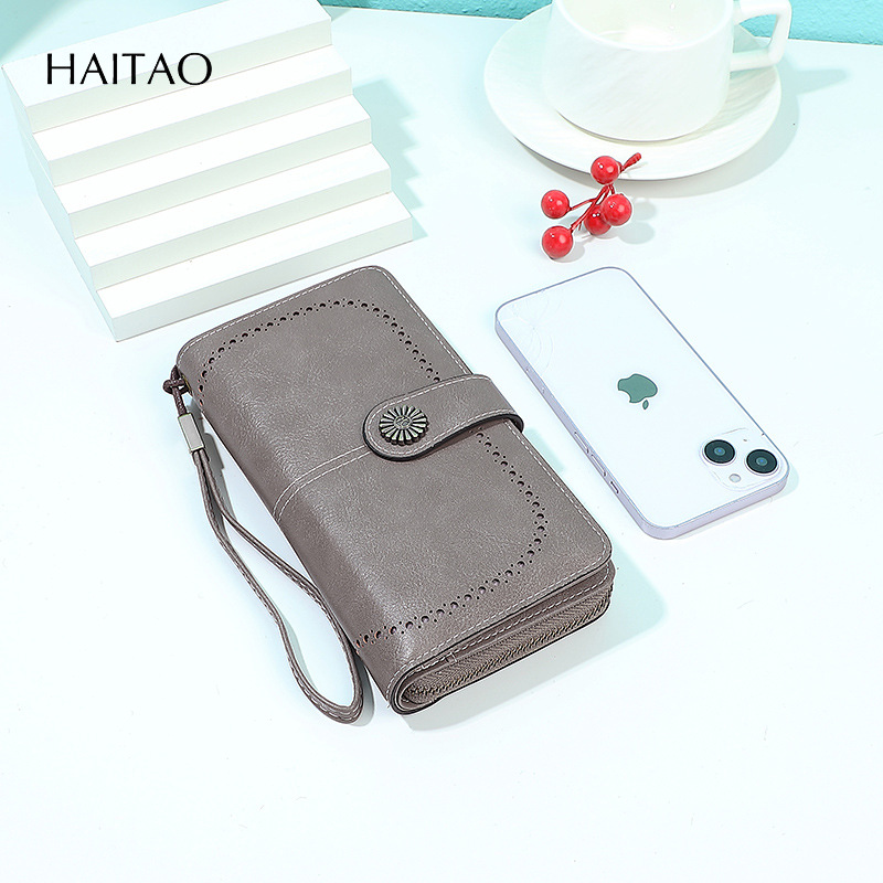 2025 nueva moda retro simple billetera larga de cuero graso para mujer bolso de mano multifuncional de gran capacidad