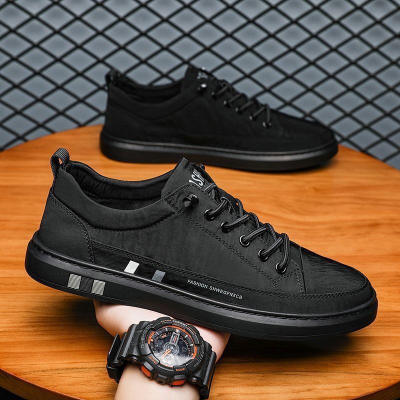 Zapatillas de hombre 2024 otoño nuevas transfronterizas populares de seda de hielo transpirables casuales zapatillas de hombre estilo europeo zapatos de hombre al por mayor.
