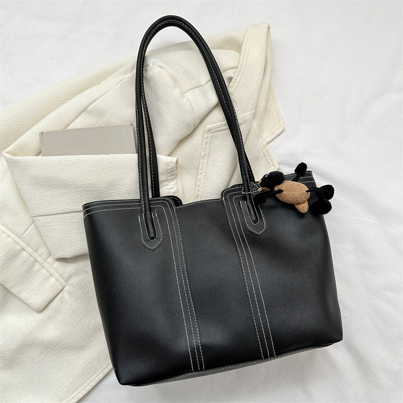 Estilo coreano versátil bolso texturizado de las mujeres 2023 otoño e invierno nuevo hombro axila bolsa popular bolsa de asas este año