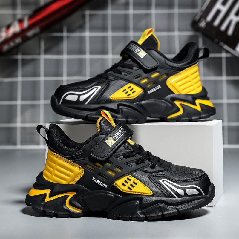 Zapatos de los muchachos al por mayor Zapatillas de deporte para niños malla transpirable primavera y otoño cuero nuevo estudiante Medio y grandes niños campus zapatos