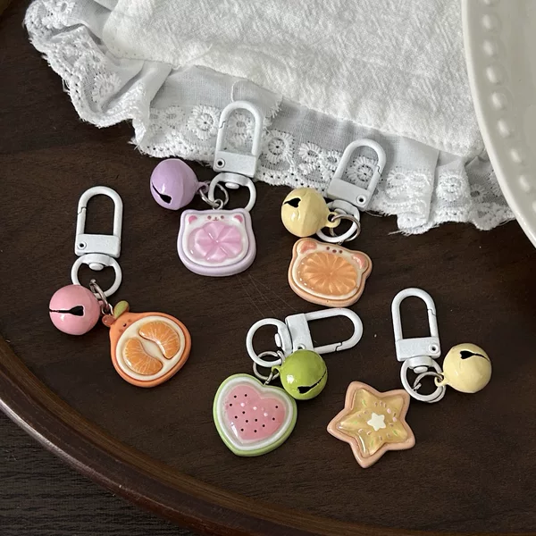 Jelly fruit keychain with bells, cute orange, watermelon, and carambola pendants, fun bag accessories, gifts