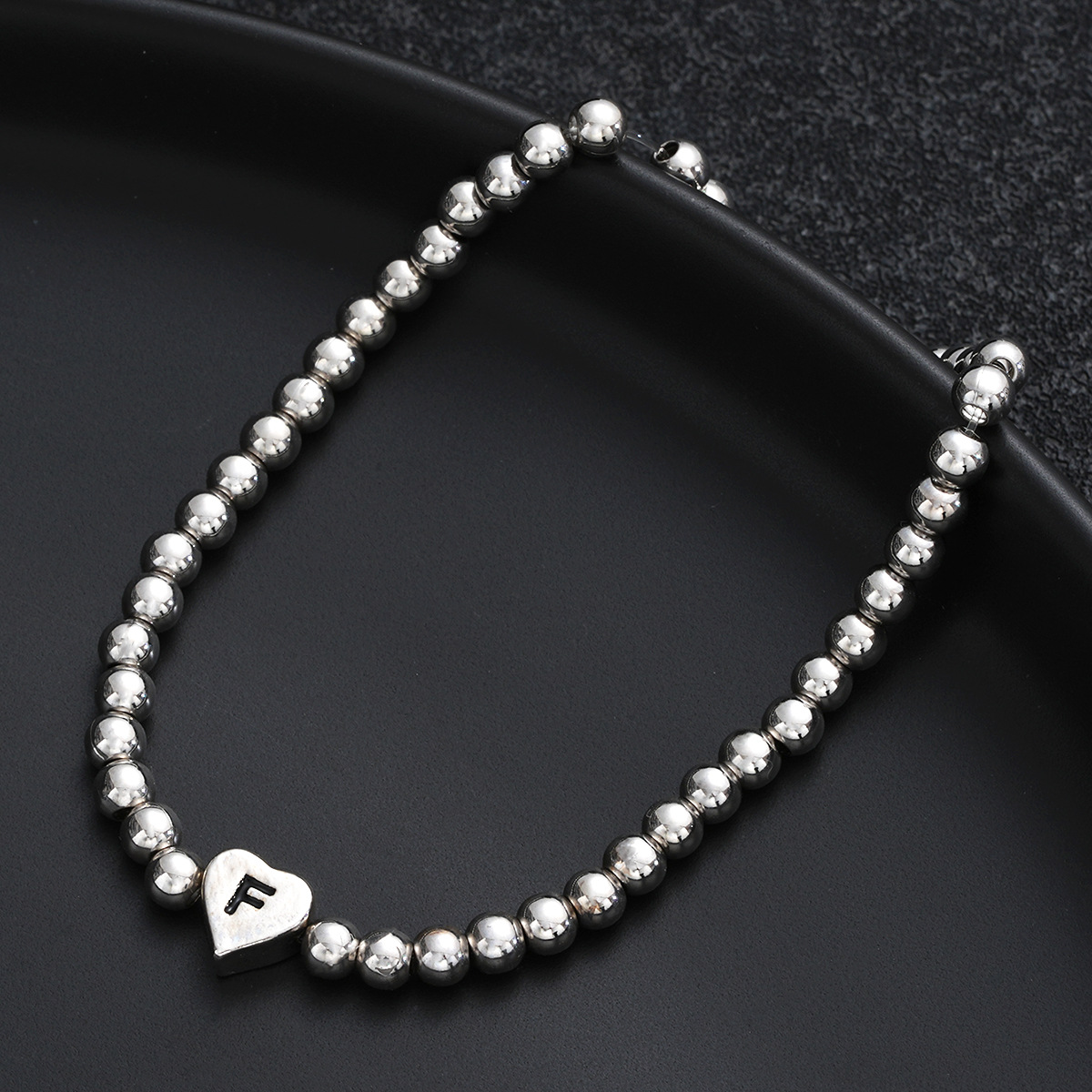 Hot Selling Creative 26 Letter Beaded Heart-shaped Copper Bracelet Fashion Ins Simple Beaded Elastic Bracelet_voghion.com