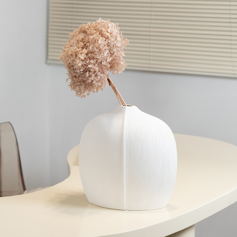 El viento silencioso de la cerámica negra estampada ornamentos de vasijas de flores de la sala de estar armario de televisión entrada flor seca decoración creativa