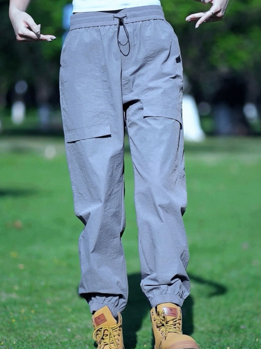 Fábrica directa de pantalones secos rápidos para hombres y mujeres de verano nuevos pantalones ligeros y transpirables parejas sueltos de pies deportivos casuales de nueve puntos