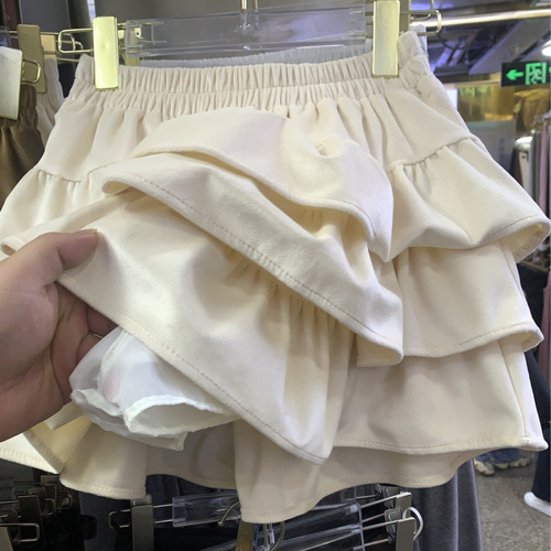 Korean-style solid-color elastic-waist tiered dress for women — spring/summer new collection, sweet, slimming, and flirty with ruffled hemlines and a voluminous silhouette.