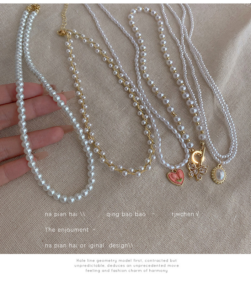 Retro Heart Shape Bow Knot Alloy Inlay Artificial Pearls Womenu0027S Pendant Necklace Necklace 1 Pie