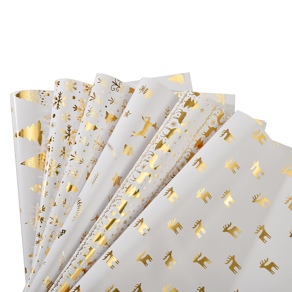 Navidad nuevo brillante papel de bronce estampado árbol de Navidad copo de nieve regalo de Navidad papel de embalaje de regalo al por mayor