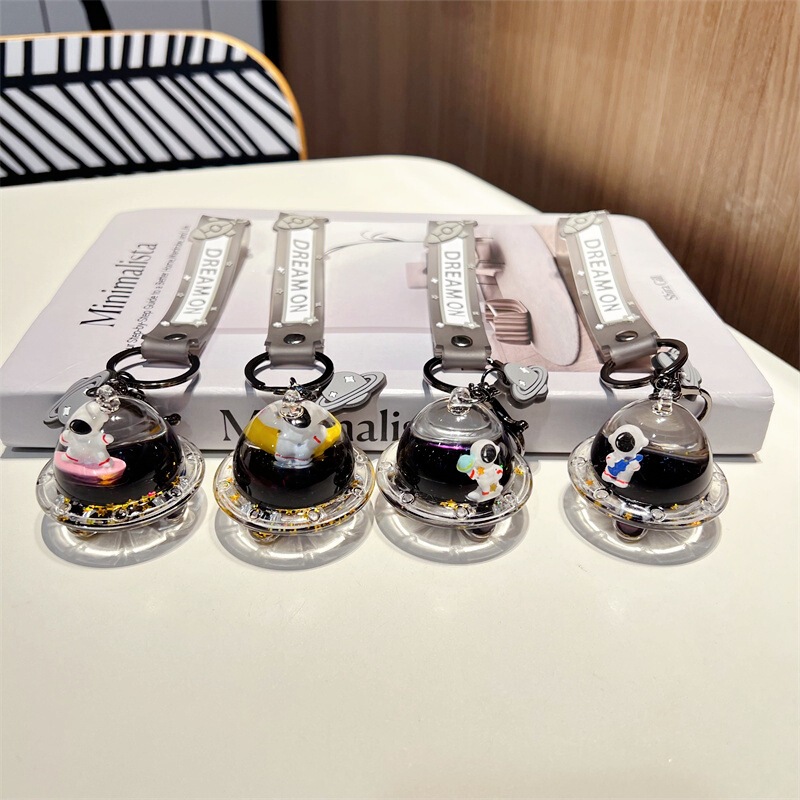 Creative drifting bottle Black Gold spaceship oil keychain cute floating liquid astronaut quicksand bottle pendant