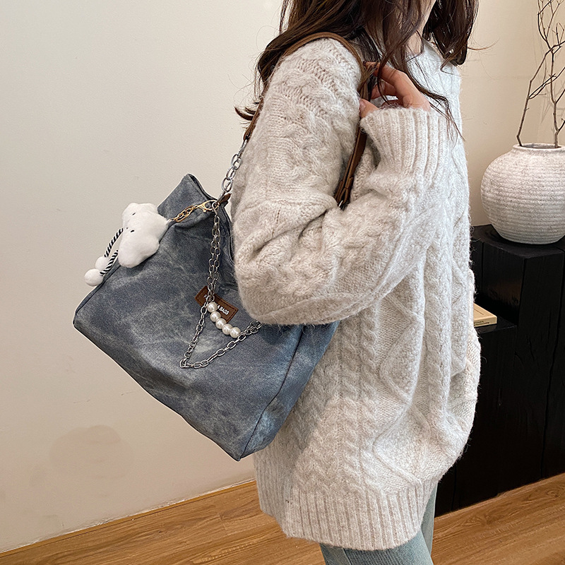 Capacidad de gran cadena de TOT 2024 nueva bolsa de moda de viaje de hombro de invierno para estudiantes universitarios superiores bolsa de clase