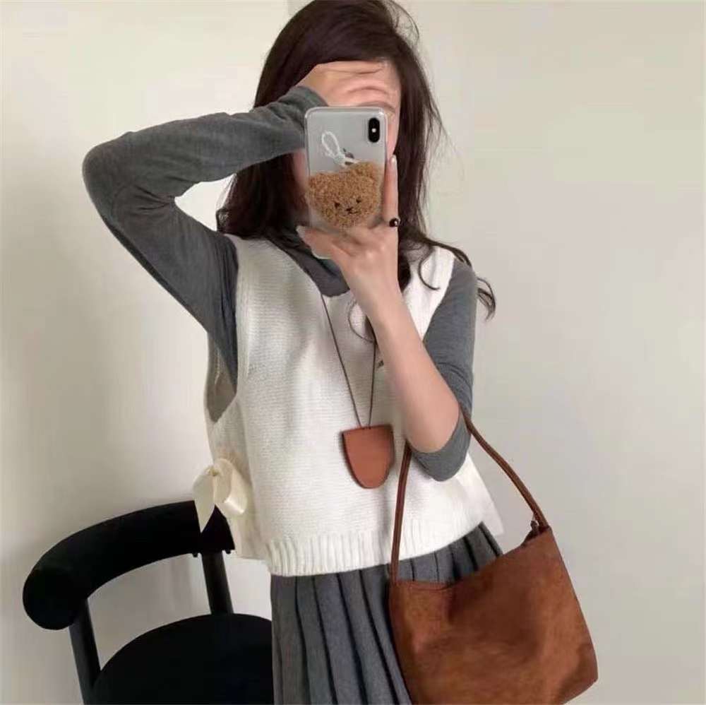 24 invierno Puyuan leche primavera y otoño lazos de arco chaleco de punto chaqueta de vestir