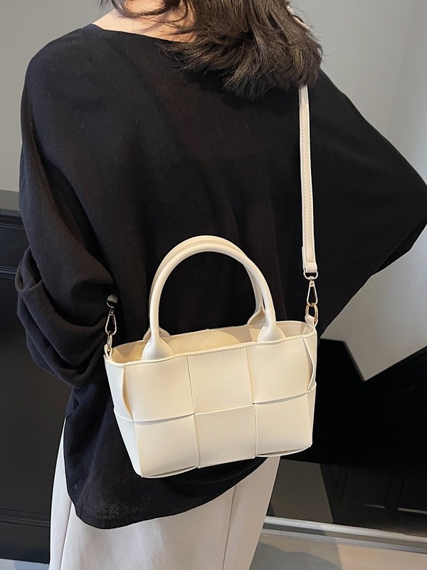 Diseño coreano de nicho de alta sensación portátil bolso de cubo de moda para mujeres 2024 nuevo tejido retro hombro mochila
