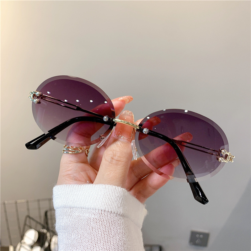 New Sunglasses Women's Oval Gradient Sunglasses Frameless Cutting Edge Trendy Glasses_voghion.com