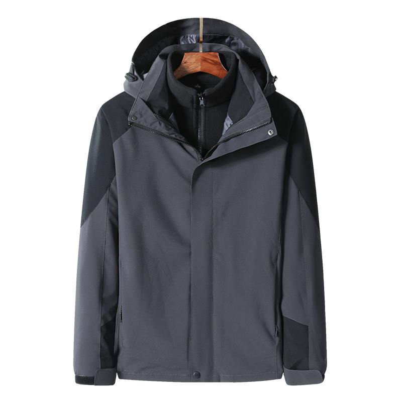 Fábrica directa al aire libre tres en uno vestir de asalto otoño y invierno para hombres y mujeres a prueba de viento a prueba de agua desmontable chaqueta de calor interior