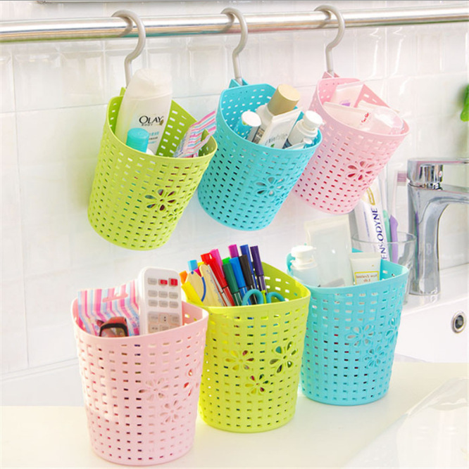 Casa de moda multiusos patrón hueco color caramelo pastoral pequeña flor cesta colgante tamaño pequeño almacenamiento en el hogar