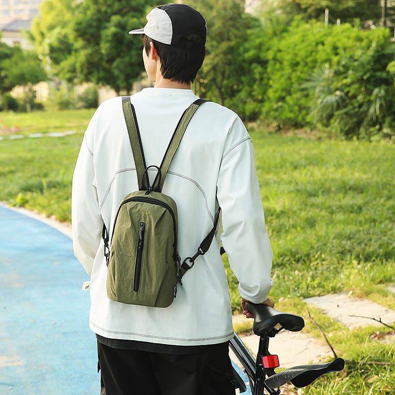Nuevo estilo pequeño y fresco bolso de mensajero de pareja para hombres y mujeres, mochila de moda simple, mochila de ocio al aire libre de ciclismo multifuncional