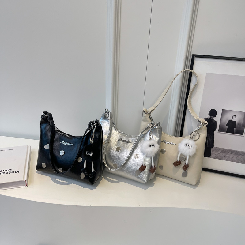 Una bolsa de brazo mayorista nueva textura bolso de mano exterior bolso de mujer de verano pequeño diseño urbano bolso de mujer simple