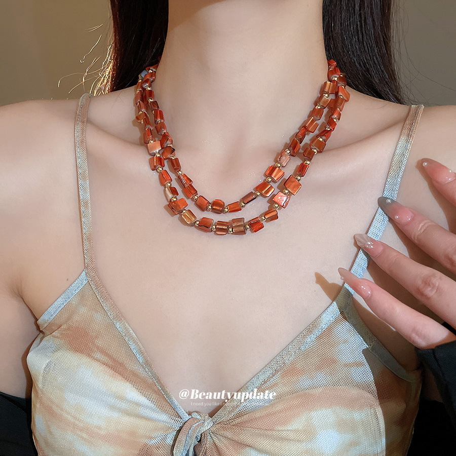 Collar con cuentas de concha de color irregular de verano Cadena de clavícula salvaje retro europea y americana