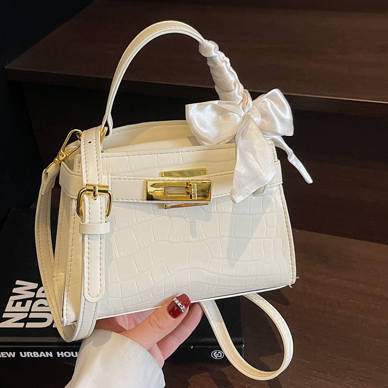 Bolso de mano para mujeres 2026 nueva moda primavera exquisita bolsa de hombro universal bolso de transporte diario image 1