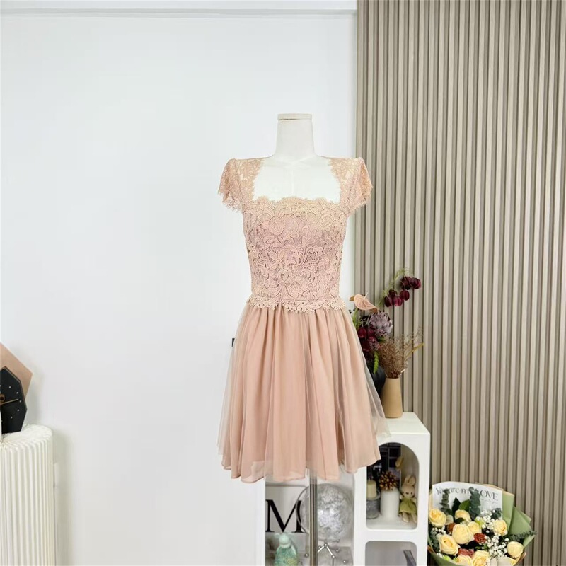 The Dress Features a Very Spicy and Alluring French Lace Patchwork Design with a Cinched Waist, Mesh Fabric, and Small Flutter Sleeves, Offering a Slim and Sweet Fit The Dress Features a Very Spicy and Alluring French Lace Patchwork Design with a Cinched Waist, Mesh Fabric, and Small Flutter Sleeves, Offering a Slim and Sweet Fit