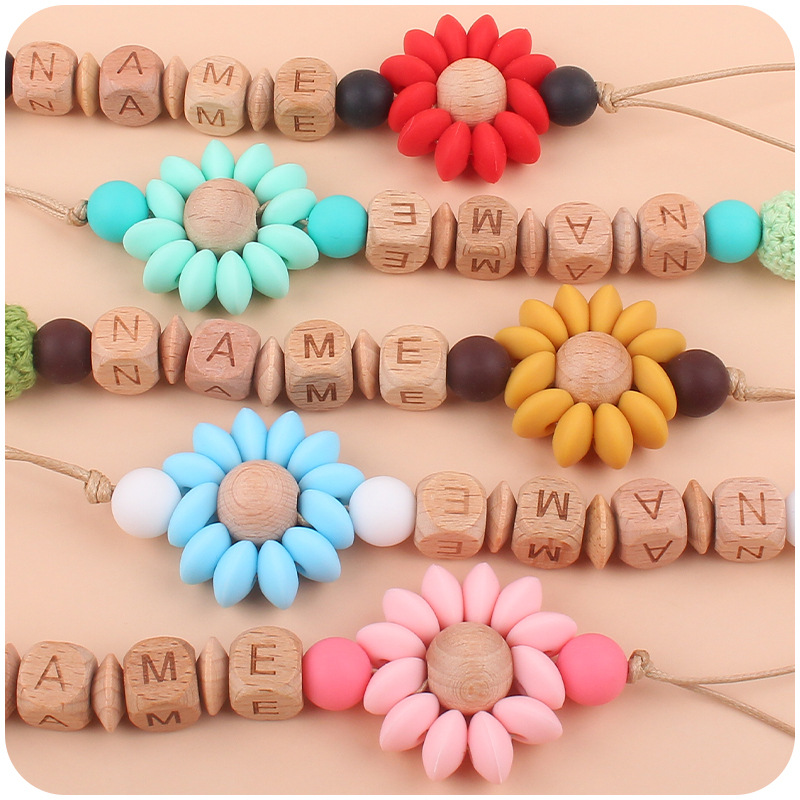 Nuevo bebé suministros de haya amor chupete clip calmante bebé Flor de dibujos animados mordedura de silicona molar chupete cadena