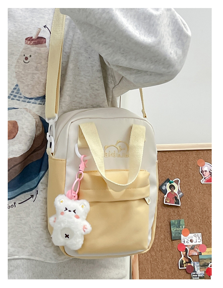 A Japanese niche double-sided multi-purpose bag for girls, a fresh and cute student single-shoulder bag, versatile carrying bear, +3 yuan undefined