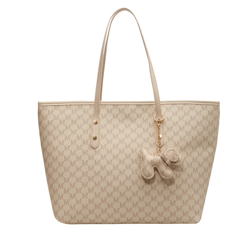Bolso de alta sensación para mujeres 2025, nuevo tipo de bolso de mano, bolso de viaje de moda universal, bolso de hombro de gran capacidad