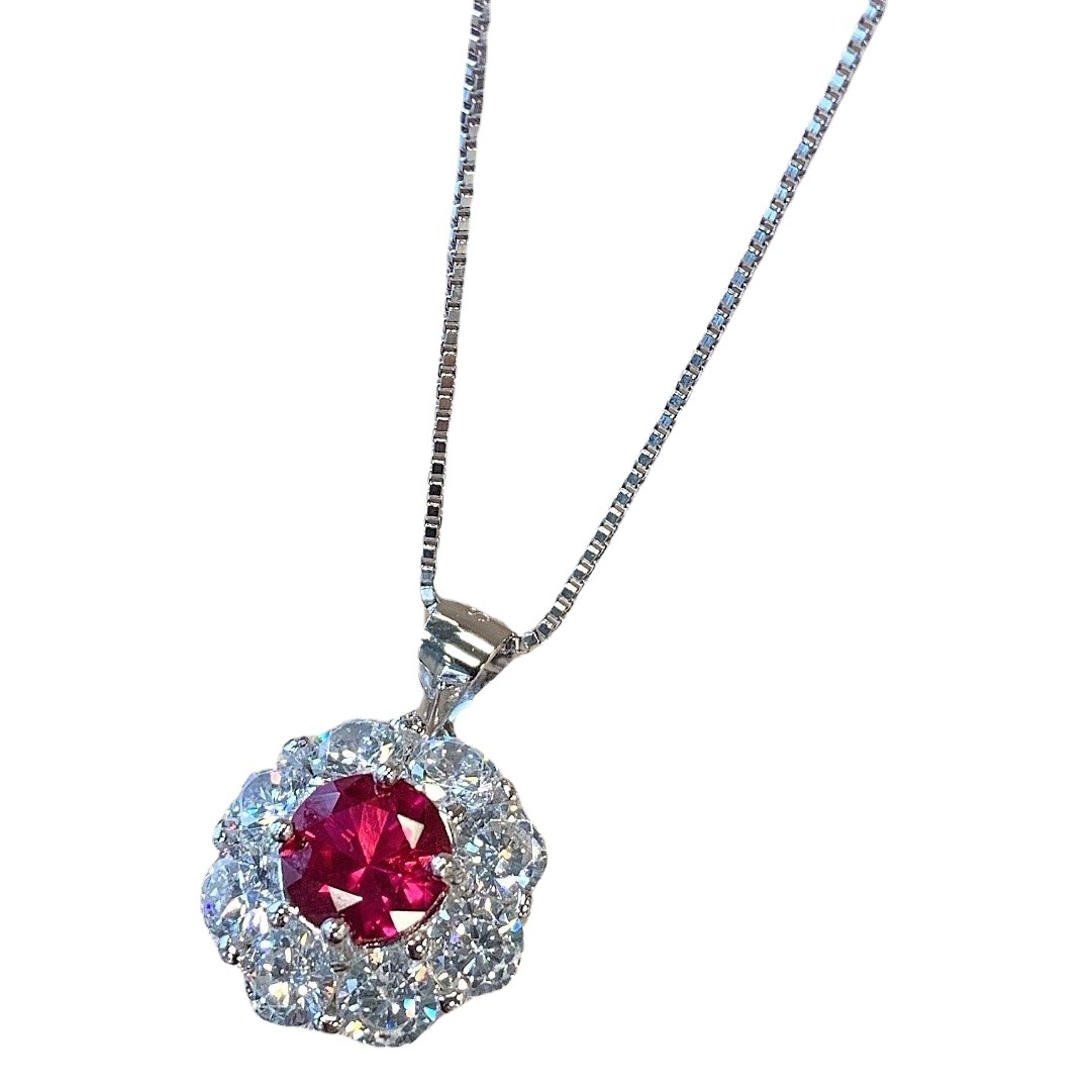 Zhuang Sheng joyería S925 plata vintage simulación Ruby Dan-anillo en forma de pendientes colgante de tres piezas conjunto de piedra principal 7mm