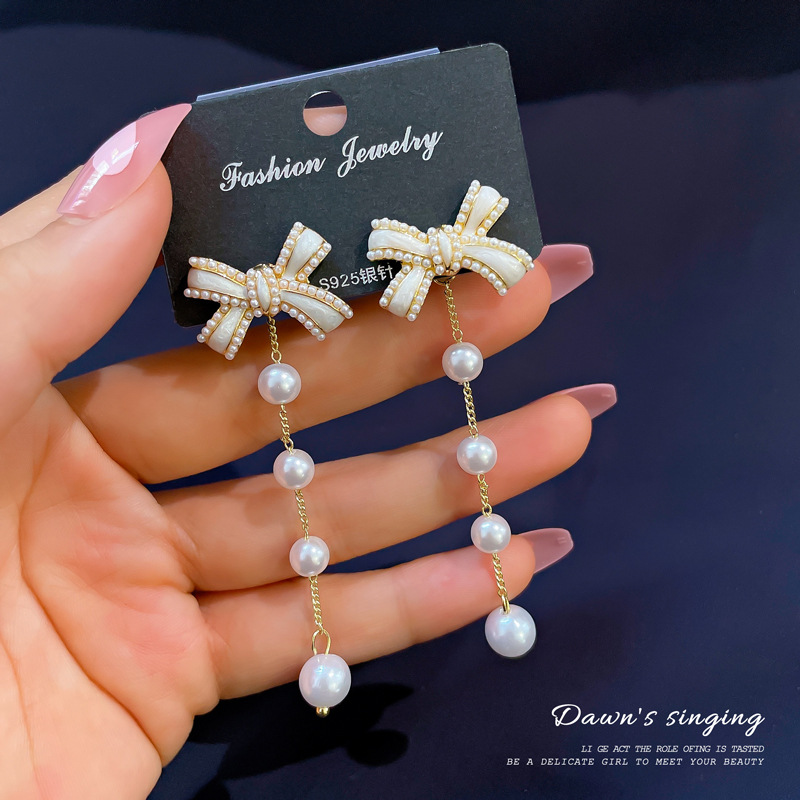 Dripping Bowknot Pearl Earrings Korean Tassel Long Super Fairy Earrings Fashion Sweet Earrings display picture 2