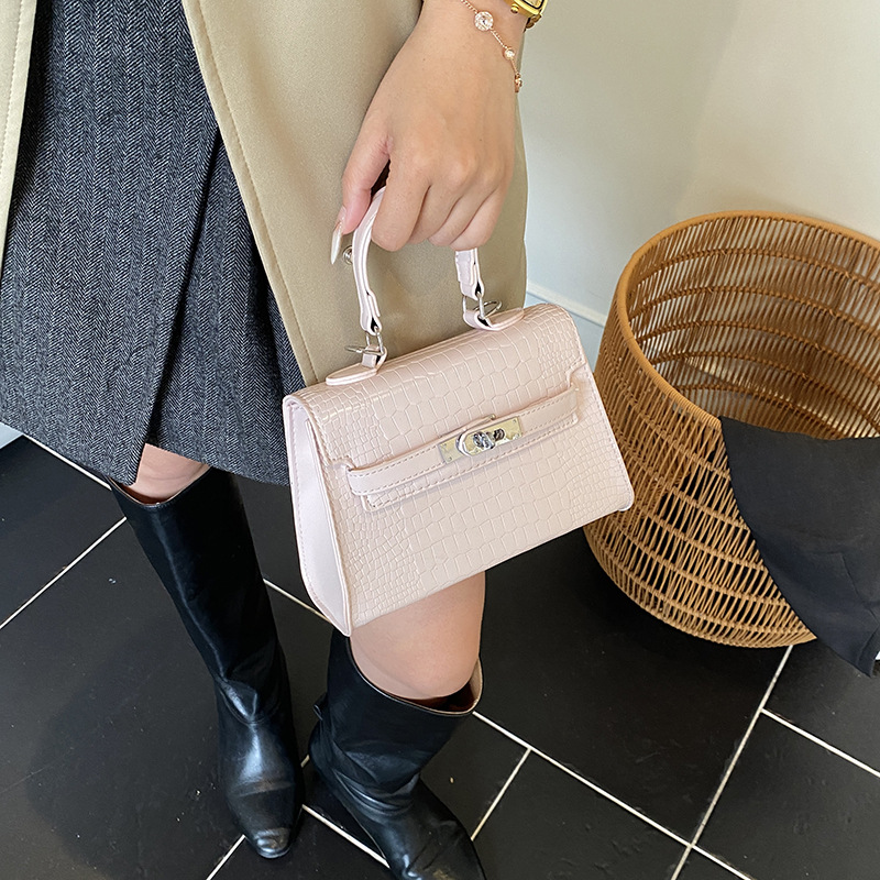 Bolsos de piedra de alta calidad para mujeres 2025, nuevos bolsos de moda portátiles de invierno versátiles mochila de viaje
