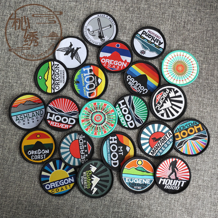 订单尾货时尚刺绣徽章批发背胶锁边补丁贴服饰电脑绣花布贴织章