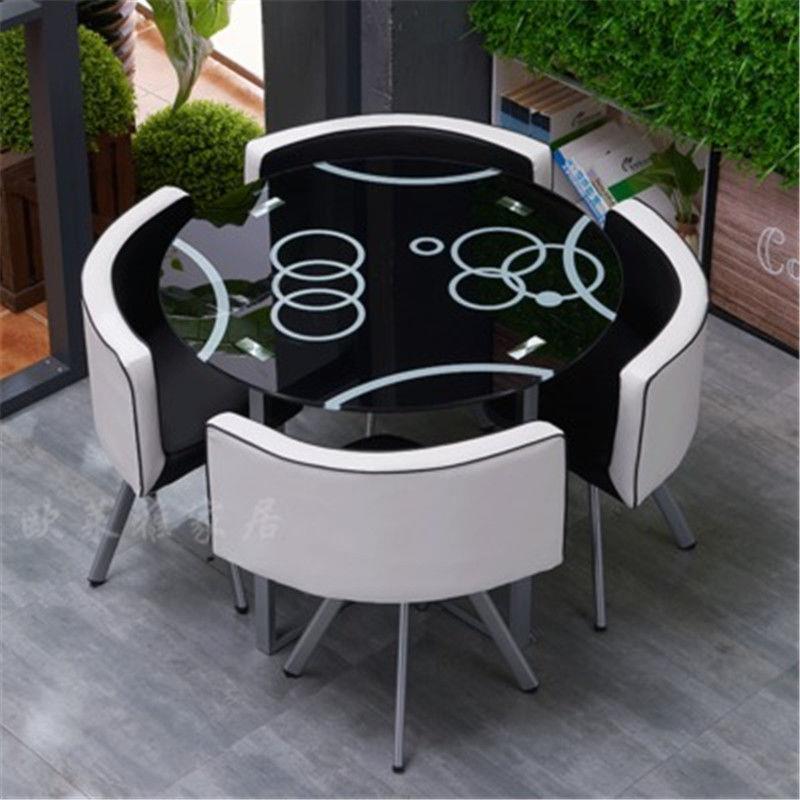 Mesa y sillas de comedor modernas, mesa redonda pequeña de vidrio templado, mesa y sillas para recepción y negociación, una mesa y cuatro sillas, cocina de inducción.