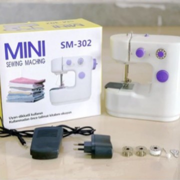 302缝纫机多功能电动家用迷你便携式缝纫机衣车带灯厂家直销
