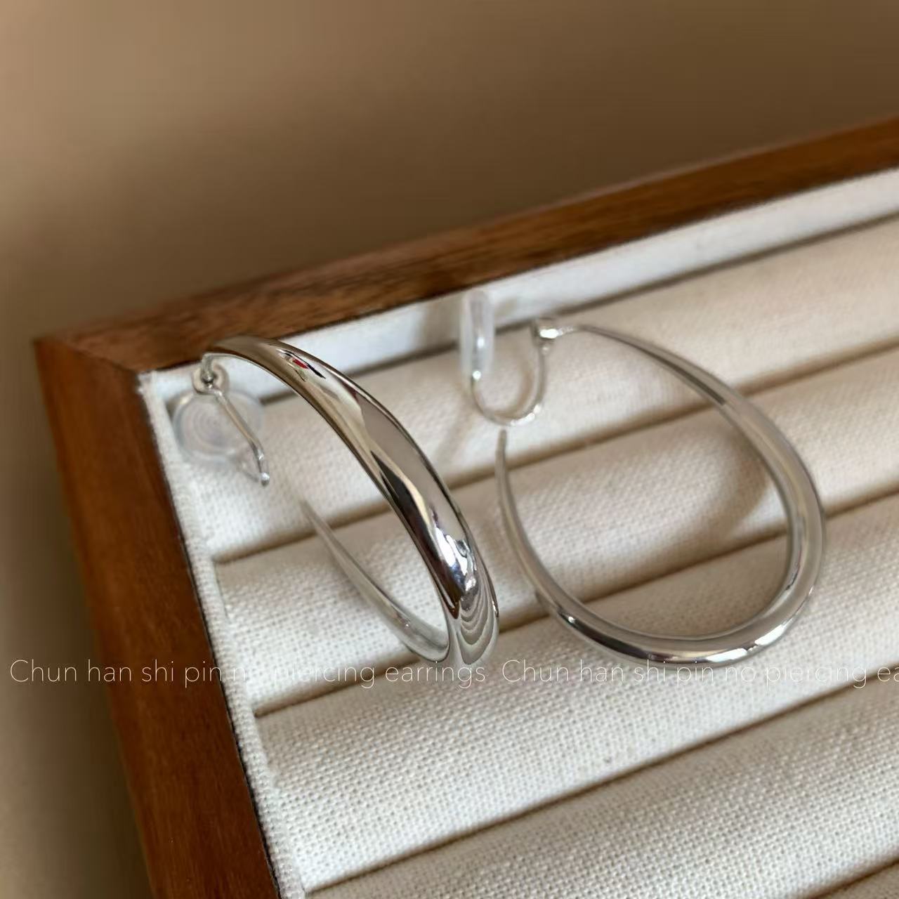 Silver drop earrings (comes with silicone pads)