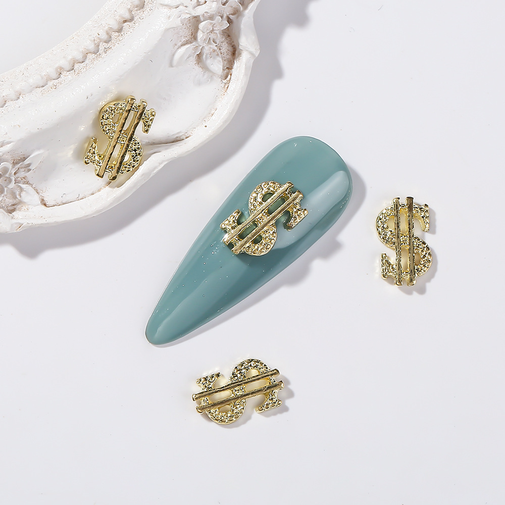 Joyería de uñas transfronteriza oro plata dólar símbolo moneda símbolo de uñas Luz de lujo flash diamante tridimensional decoración de diamantes