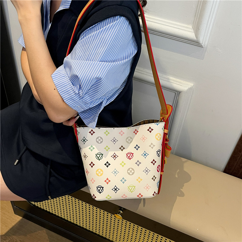 Bolso de cubo retro estilo Hong Kong 2025 verano nuevo bolso femenino personalidad bowknot bandolera moda contraste color bandolera
