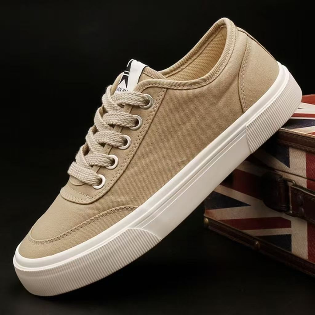 Zapatos de hombre de color sólido zapatos de lona clásicos básicos simples de estilo universal de moda baja zapatos de skate de lazos planos zapatos de mujer