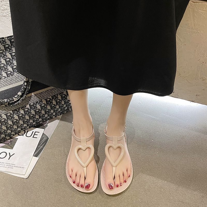 Sandalias planas con chanclas de verano para mujeres francesas 2020 nuevas sandalias coreanas en espina zapatos de playa romanos de todo fósforo para mujeres