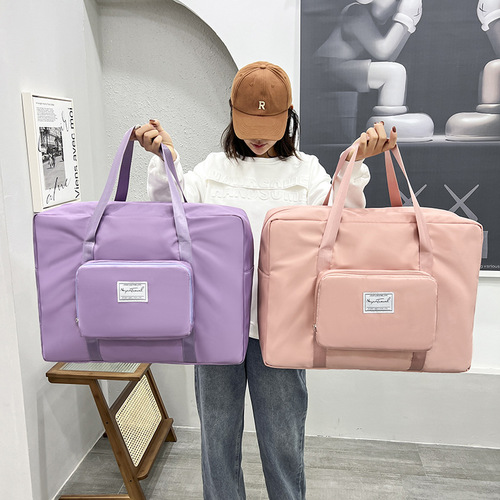 New large-capacity travel storage bag short-distance luggage bag trolley portable women's foldable travel storage bag