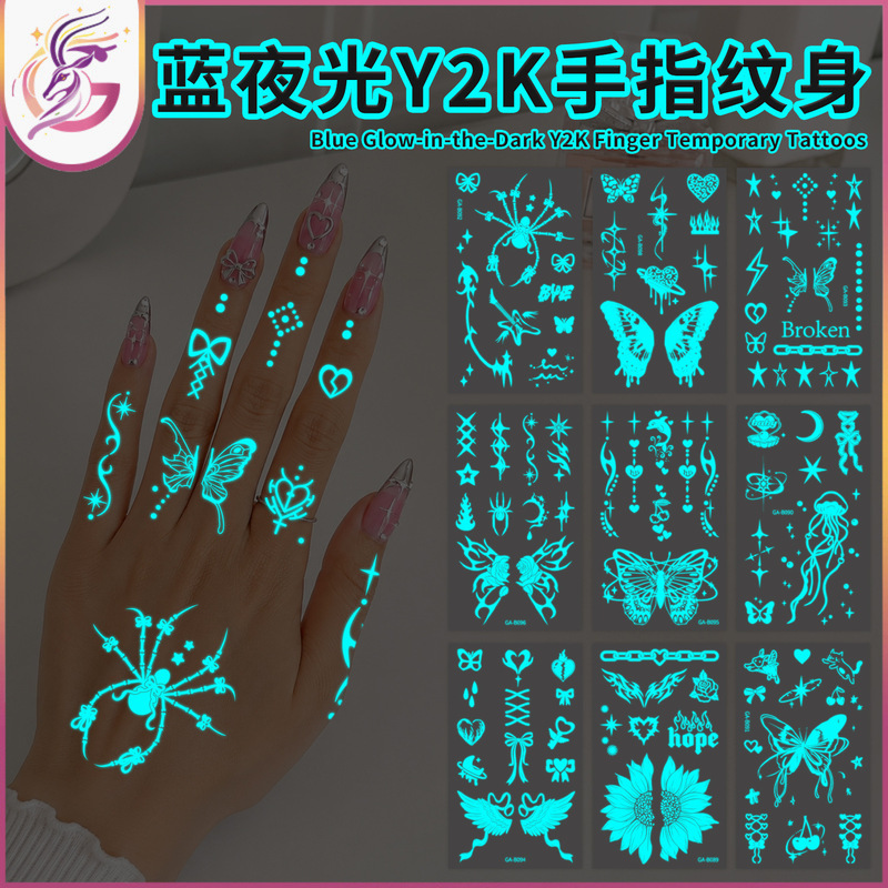 Blue Glow-In-The-Dark Y2K Finger Tattoo with Stars, Butterflies, and Lines That Glow in the Dark, Not Visible in a Bar or Dance Party Blue Glow-In-The-Dark Y2K Finger Tattoo with Stars, Butterflies, and Lines That Glow in the Dark, Not Visible in a Bar or Dance Party