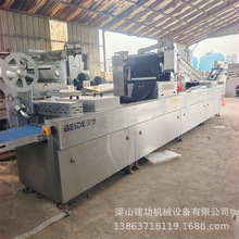 二手全自动拉伸膜包装机 牛肉红肠红薯干连续式真空包装封口机