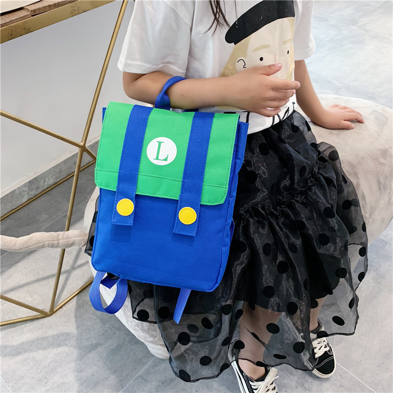 Nueva mochila infantil de estilo coreano con letras de dibujos animados impresas con LOGO, mochila para niños y niñas, mochila escolar de colores contrastantes para jardín de infantes