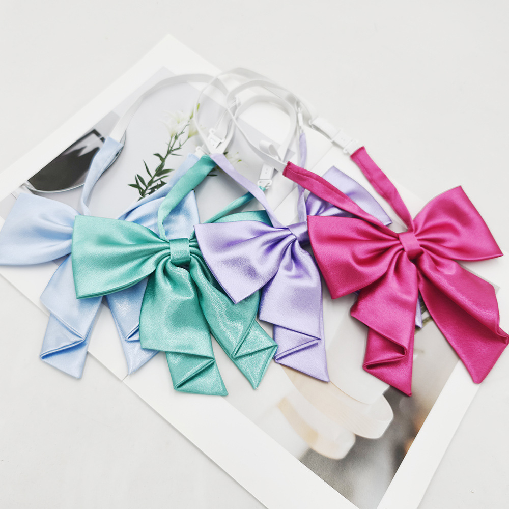 Spot al por mayor color sólido superficie brillante vino negro cuello rojo flor femenino estilo universitario nuevo estilo cola de golondrina plegable pajarita de raíz de pluma grande