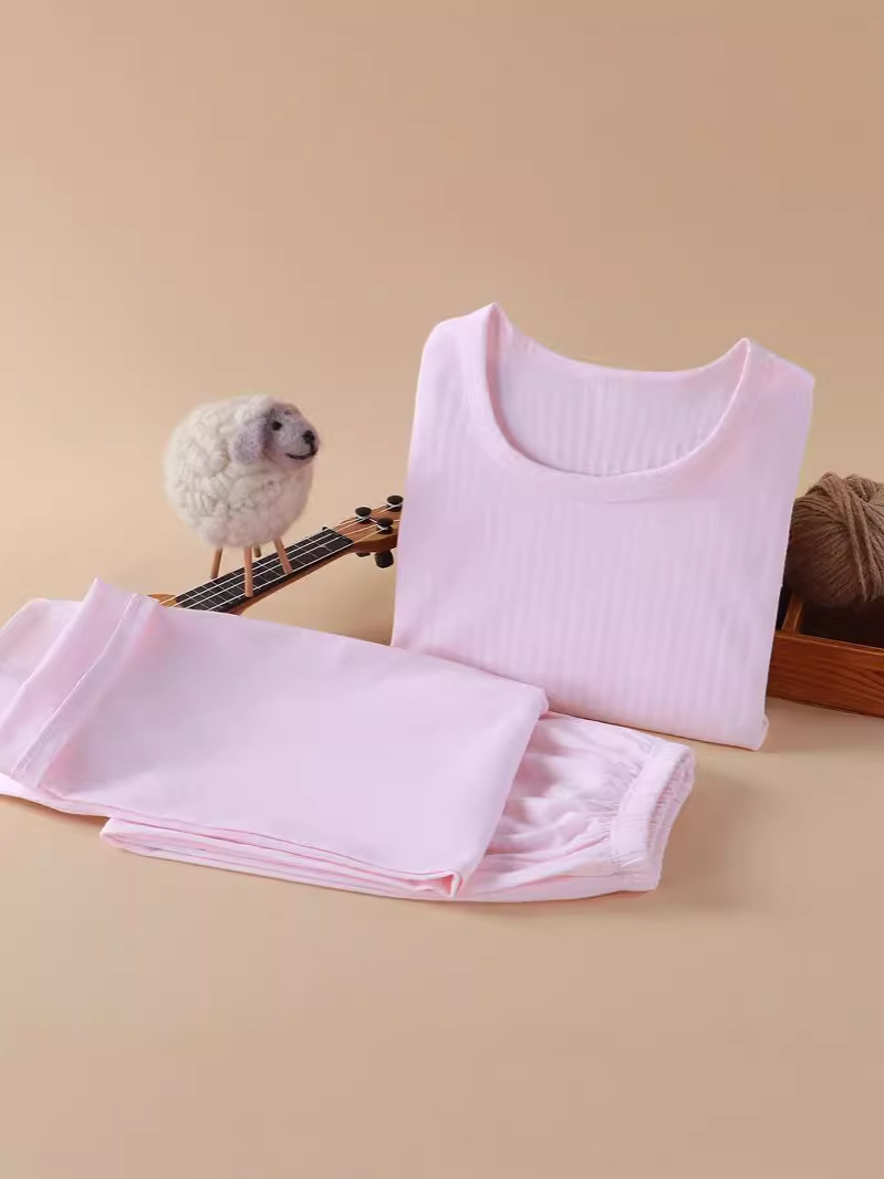 Nueva ropa infantil para el hogar sin huesos pijamas de manga larga primavera y otoño ropa de aire acondicionado de niñas algodón hombre