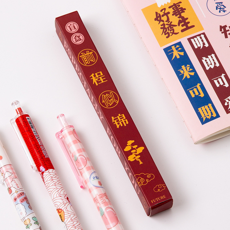 Caja ciega pluma de dibujos animados de empuje pluma de gel neto rojo de alto aspecto estudiante de secado rápido negro agua pluma Premio regalo de cumpleaños