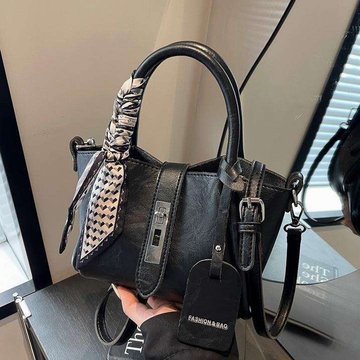 Bolso de mano universal de alta sensación para mujeres 2024 nuevo popular bolso de cubo de agua super caliente nicho de moda retro mochila