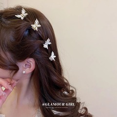 ヘアクリップの頭飾り森系仙美サメクリップのヘアクリップの蝶のヘアクリップの女性側のミニ前髪クリップのトランペット